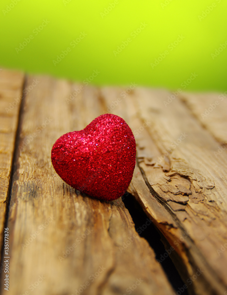 Red heart on a wood