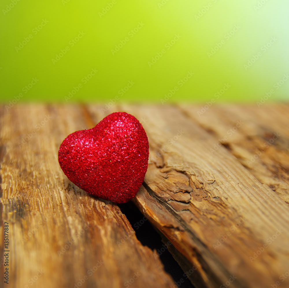 Red heart on a wood