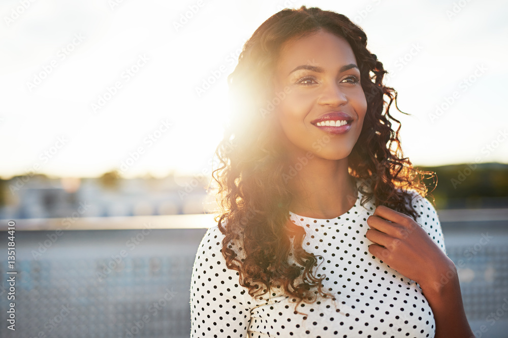 Attractive sunlit woman