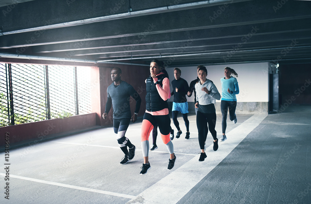 Young team of urban athletes training together