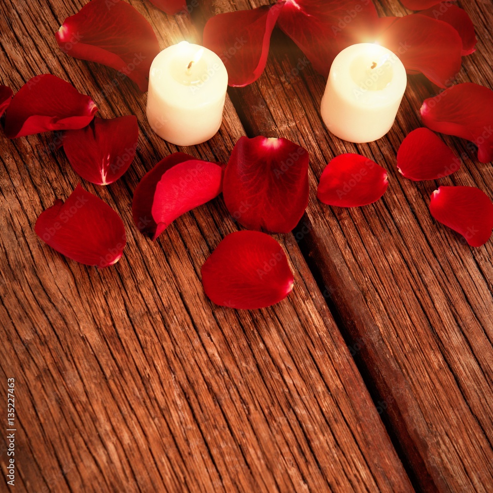 Roses on parquet with candles