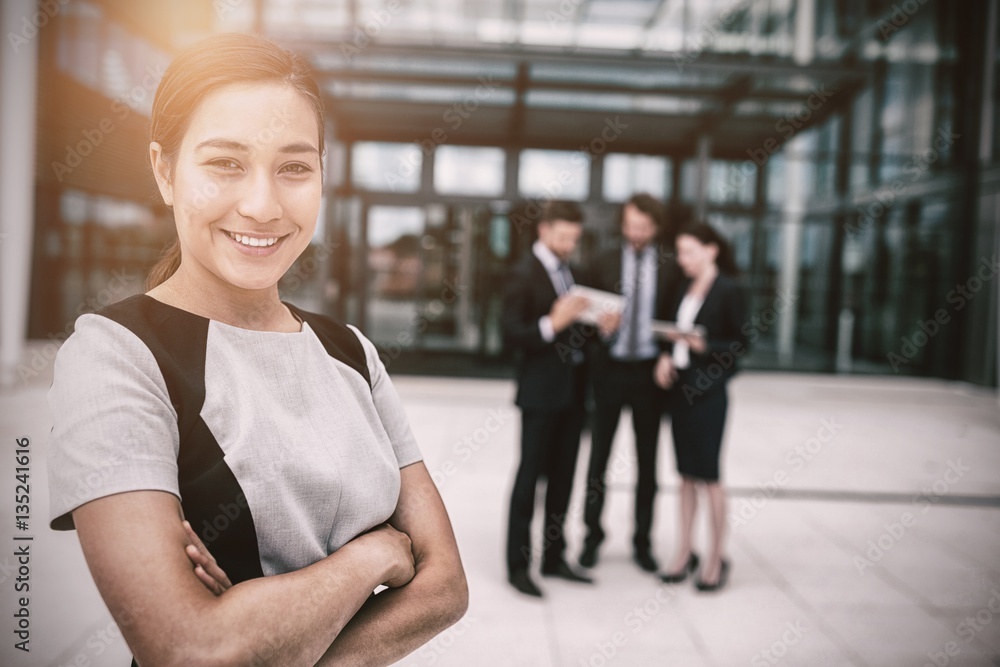 Portrait of confident businesswoman smiling