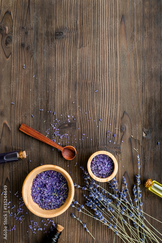 organic cosmetics with lavender on wooden background top view