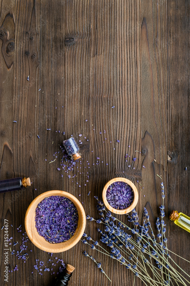 organic cosmetics with lavender on wooden background top view