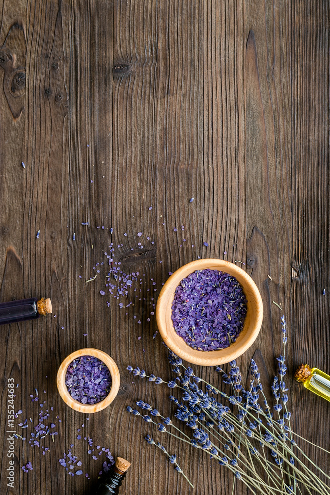 organic cosmetics with lavender on wooden background top view