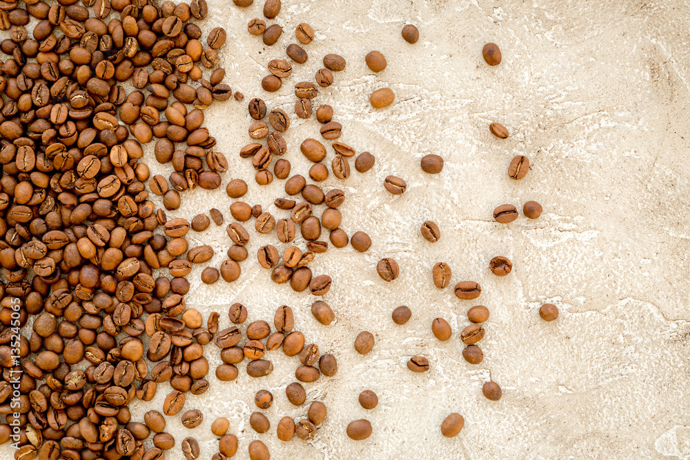 coffee beans on gray table top view