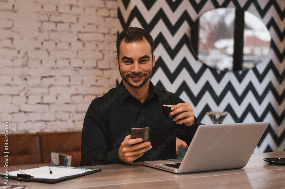 Handsome man Drinking coffee in Cafe, Relaxing from job