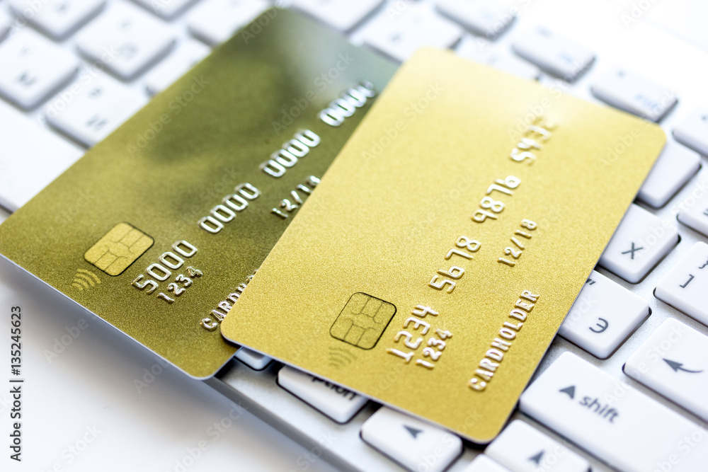 Credit cards on the keyboard close up