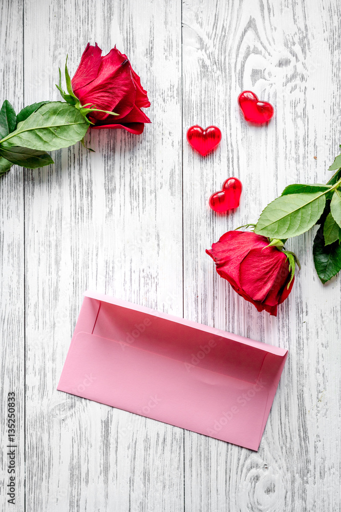 concept Valentines Day with flower wooden background top view