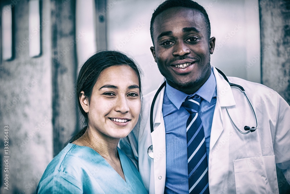 Smiling nurse and doctor