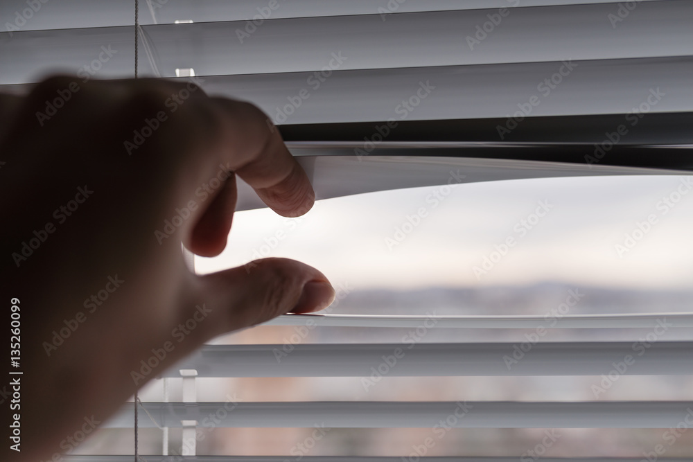 White venetian blinds. Selective focus.