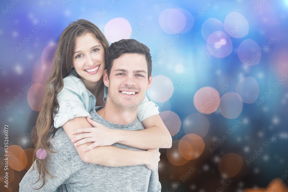 Composite image of couple embracing with arms around