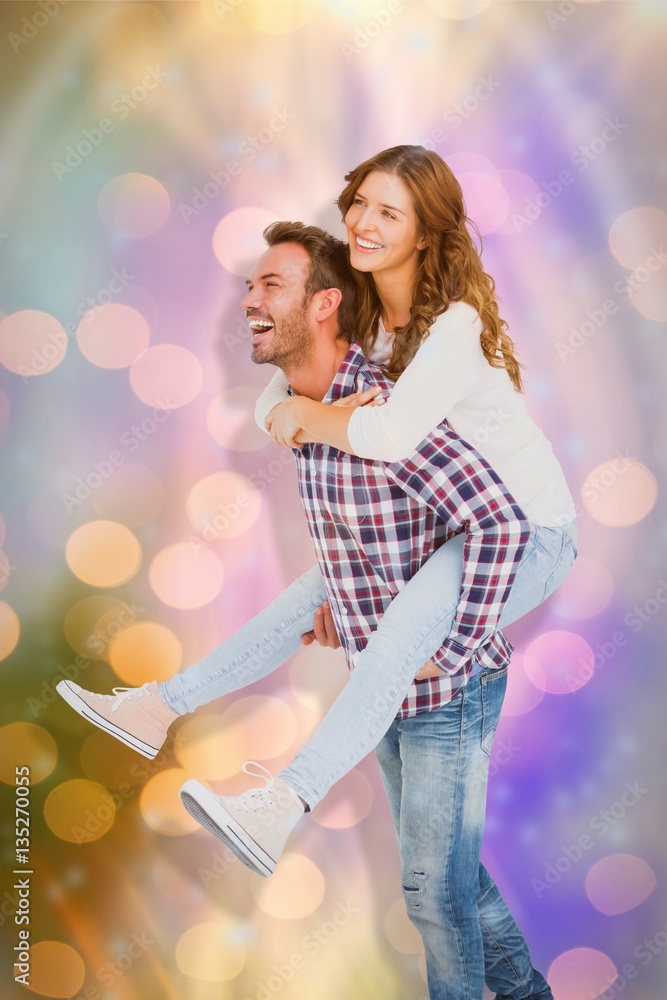 Composite image of man giving piggyback ride to woman