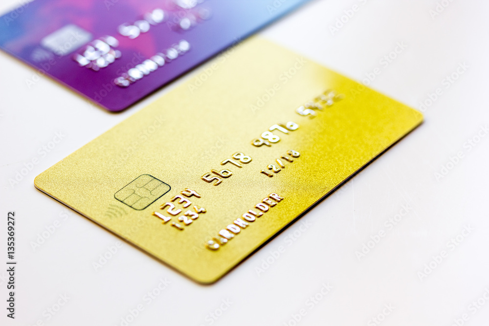 pile of credit cards on white background