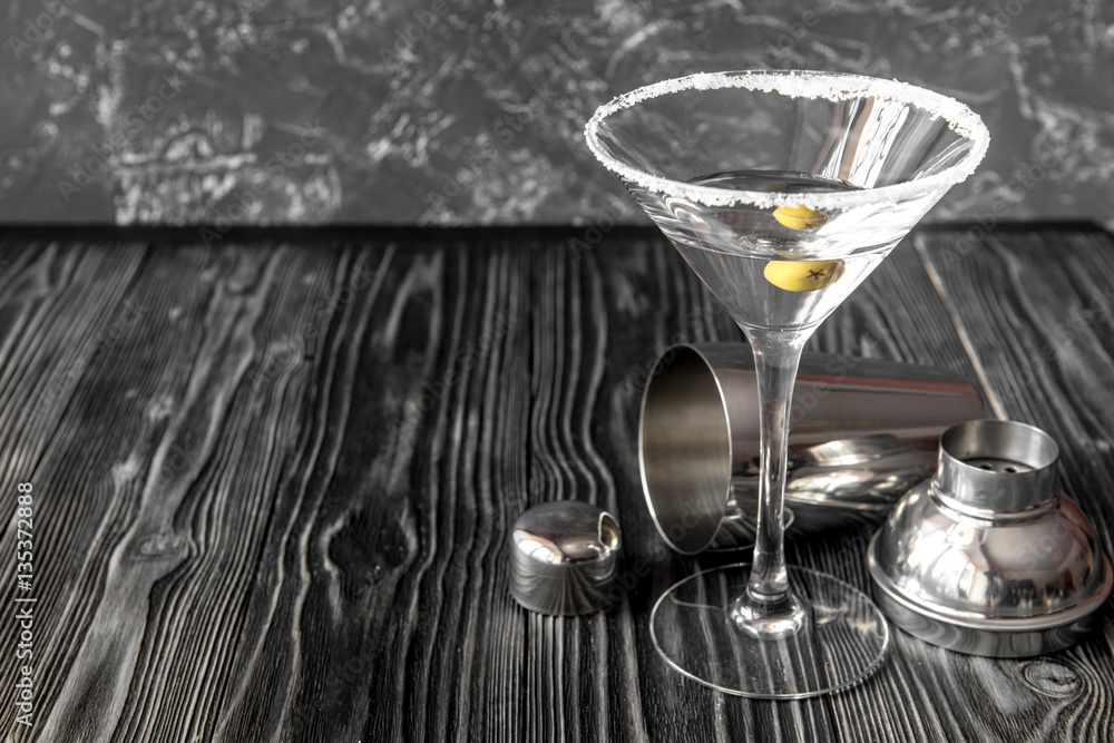 martini cocktail at wooden background close up