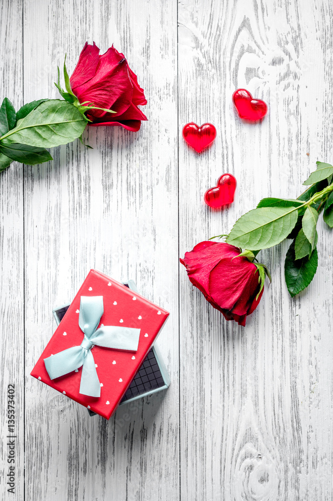 concept Valentines Day with flower wooden background top view