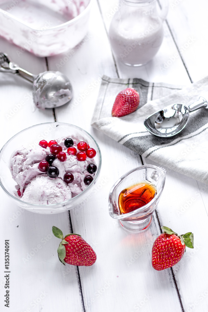 organic homemade ice cream in glass bowl on wooden background