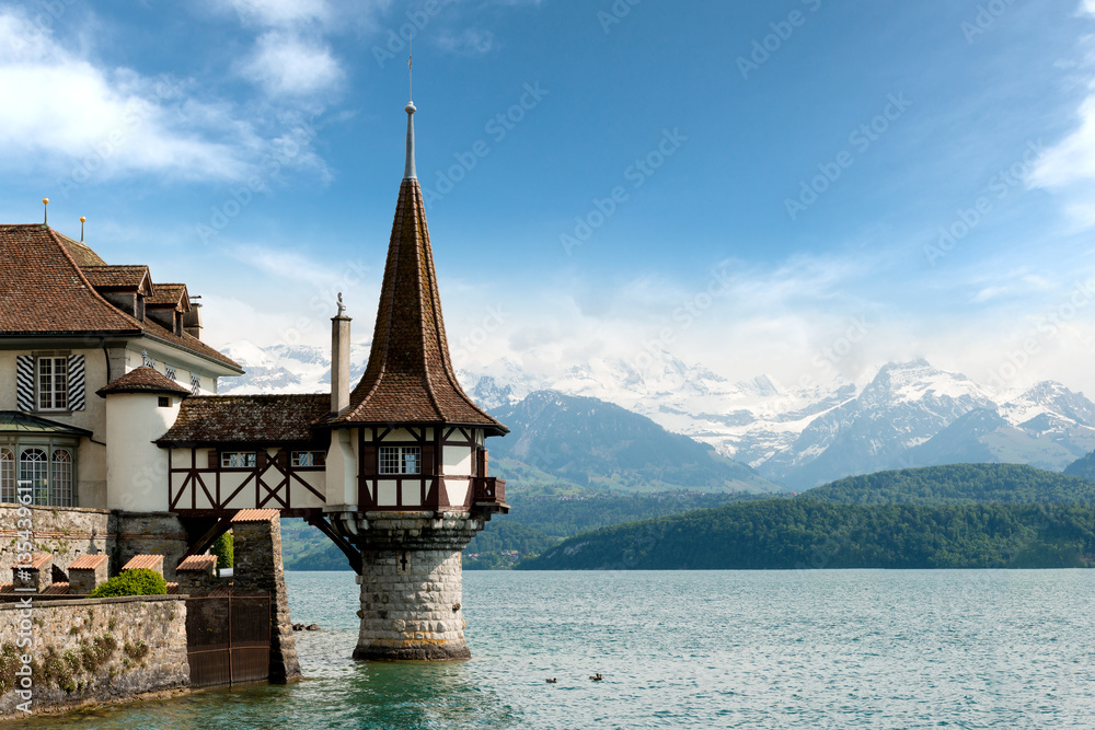 Beautiful little tower of Oberhofen castle in the Thun lake with