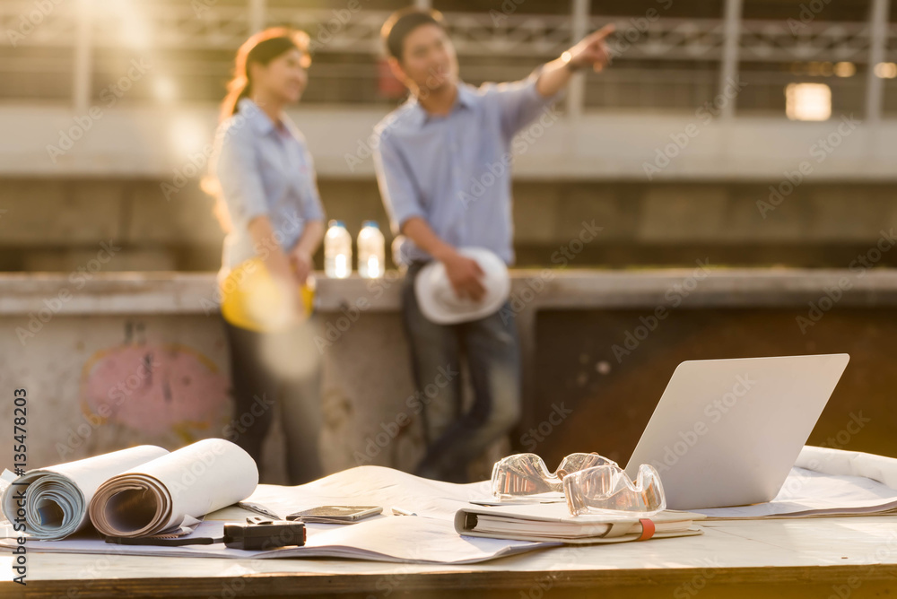 Work desk of construction engineer outdoor at after work days