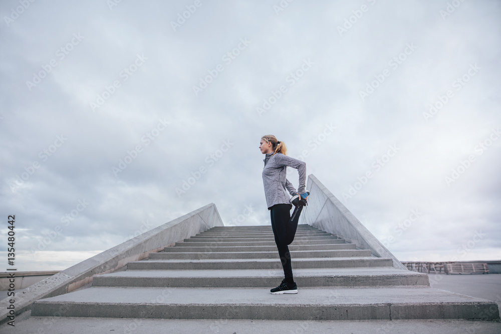 Female exercising in the morning