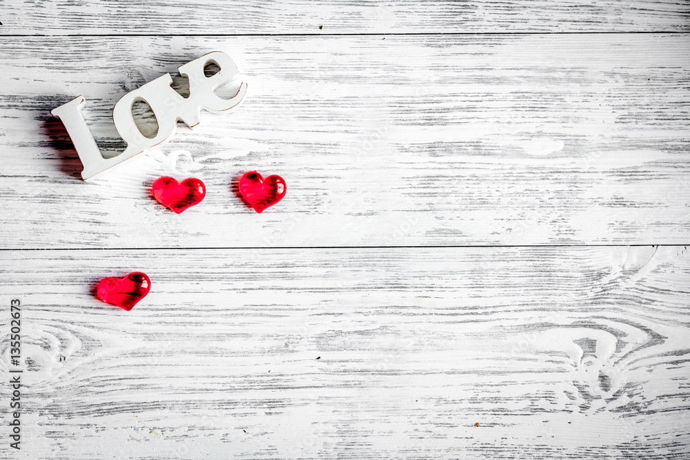 concept Valentines Day with flower wooden background top view