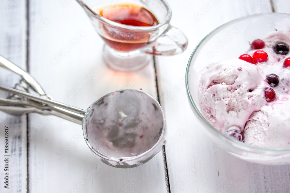 organic homemade ice cream in glass bowl on wooden background