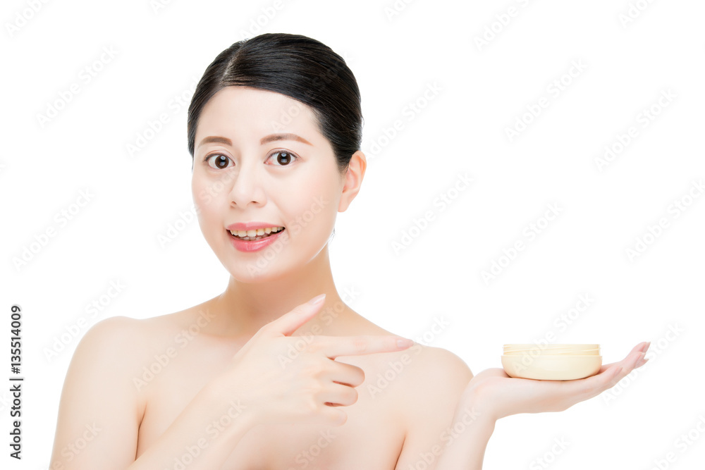 beauty asian woman pointing display facial product on face