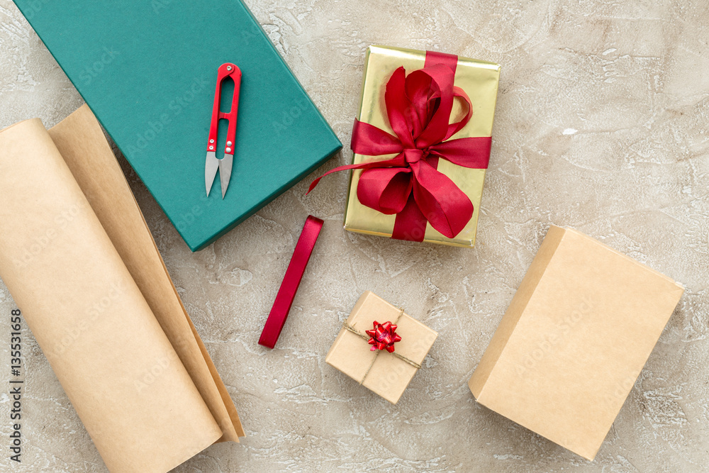 wrapping gifts in box for holiday top view mock up