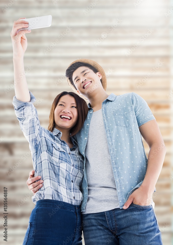 Couple taking selfie from mobile phone