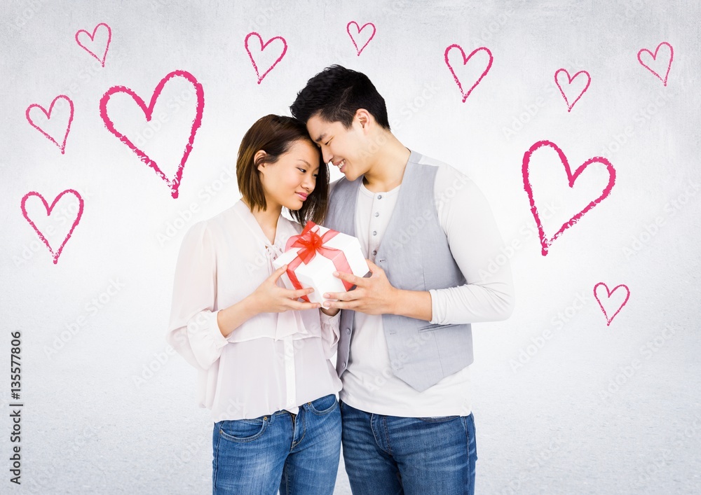 Man giving a gift to woman