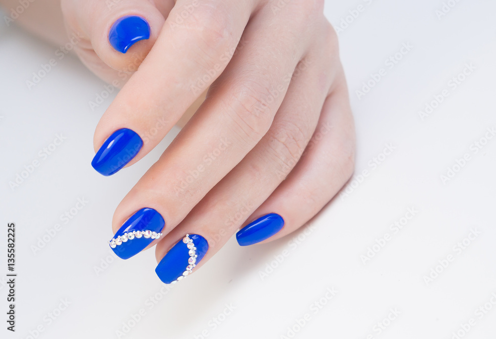 Hands and natural nails, ideal clean manicure. Decorated with stylish elements