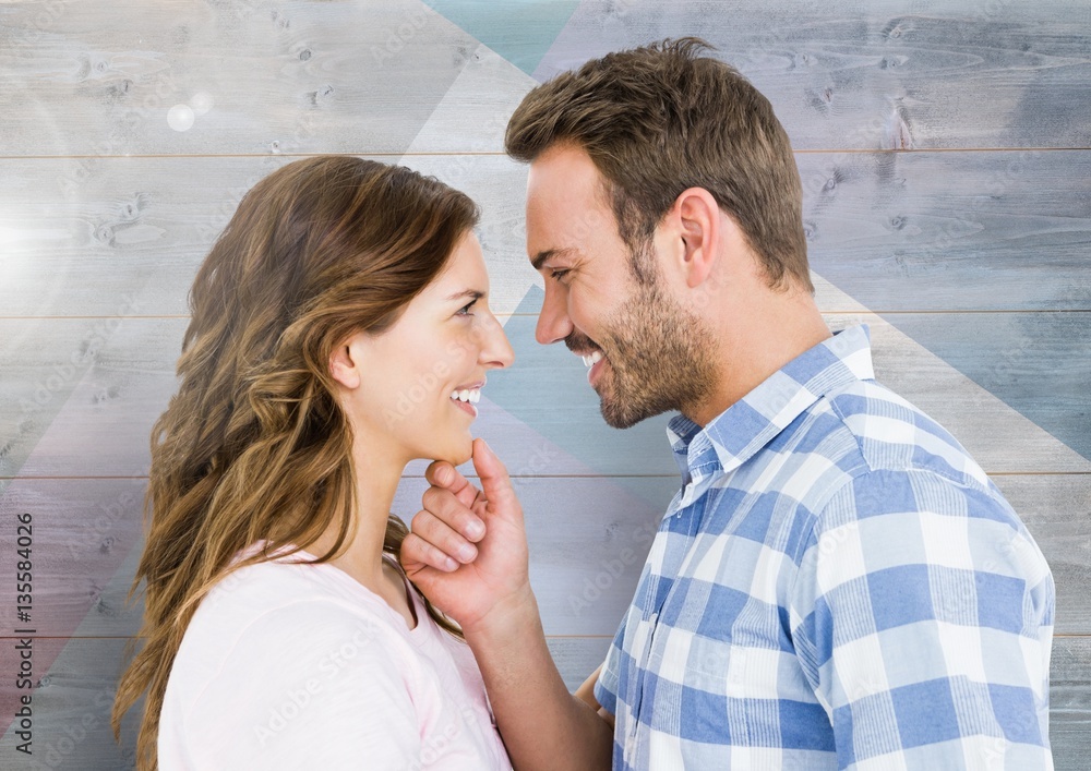 Romantic couple looking at each other and smiling