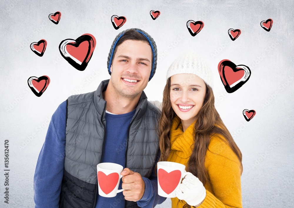 Couple with coffee mugs against white background with hearts