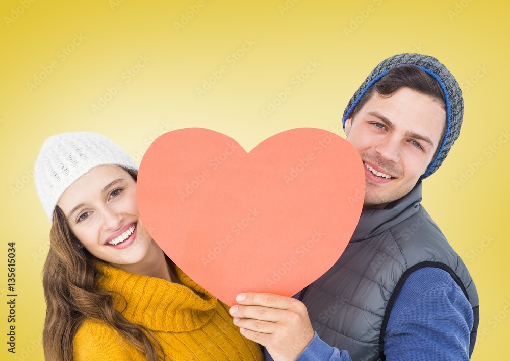 Happy couple holding heart