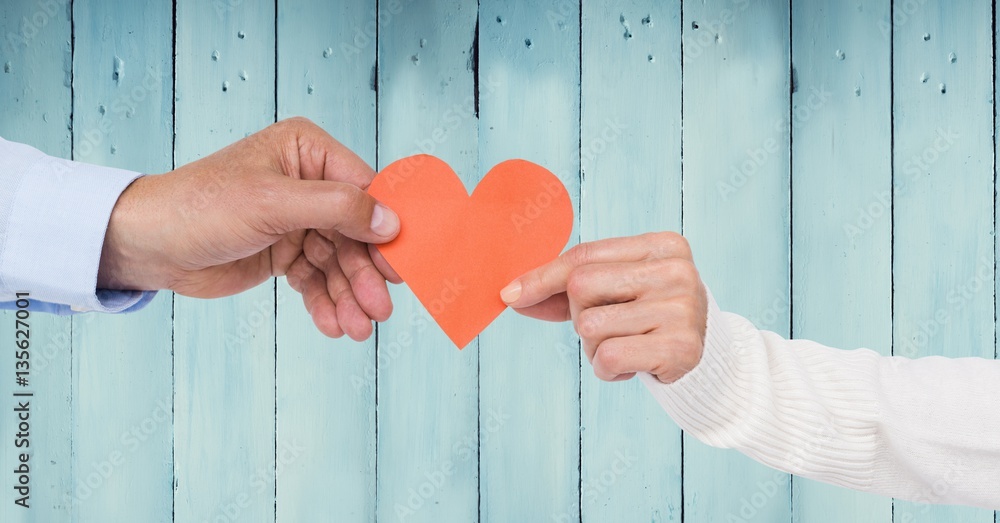 Couple hand holding heart