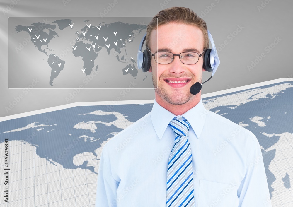 Portrait of smiling businessman with headset in office