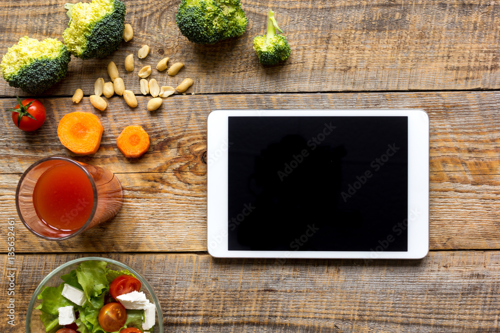 concept diet and tablet with vegetables mock up