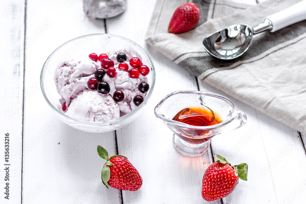 organic homemade ice cream in glass bowl on wooden background