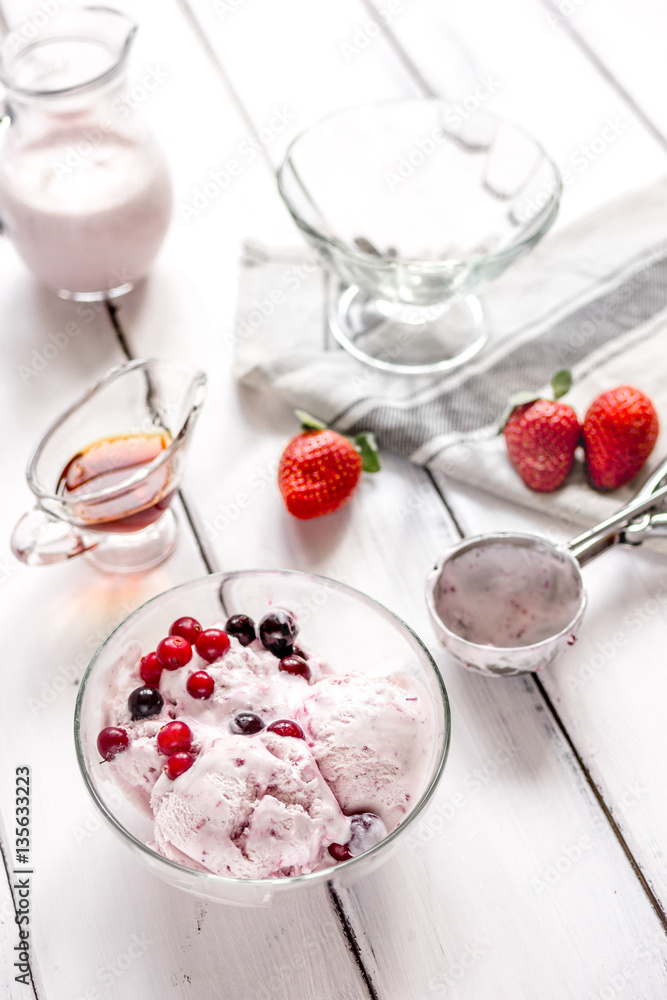 organic homemade ice cream in glass bowl on wooden background