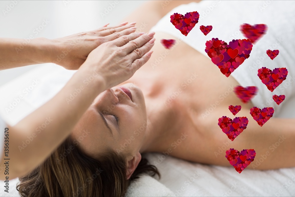 Couple receiving massage in spa