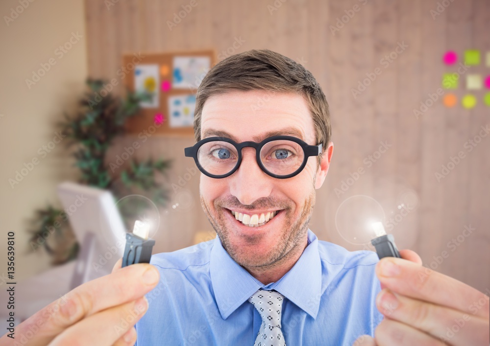 Portrait of nerd man holding cables with flare