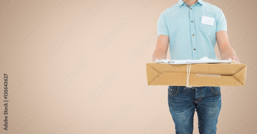 Mid section of delivery man holding parcel box