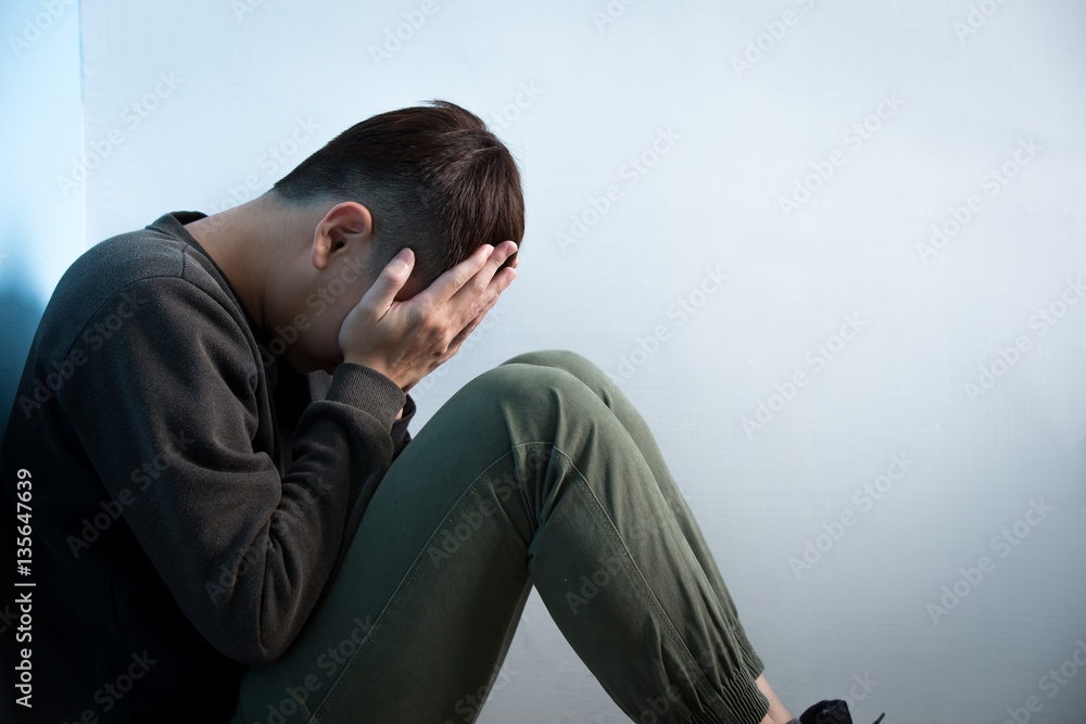 depression man sit on floor