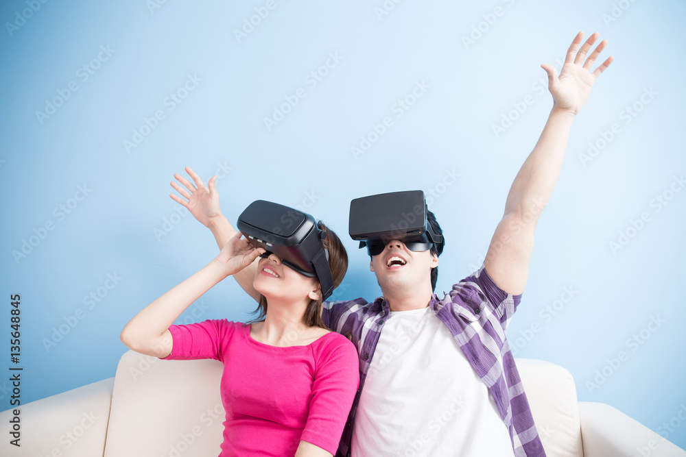 young couple play vr game