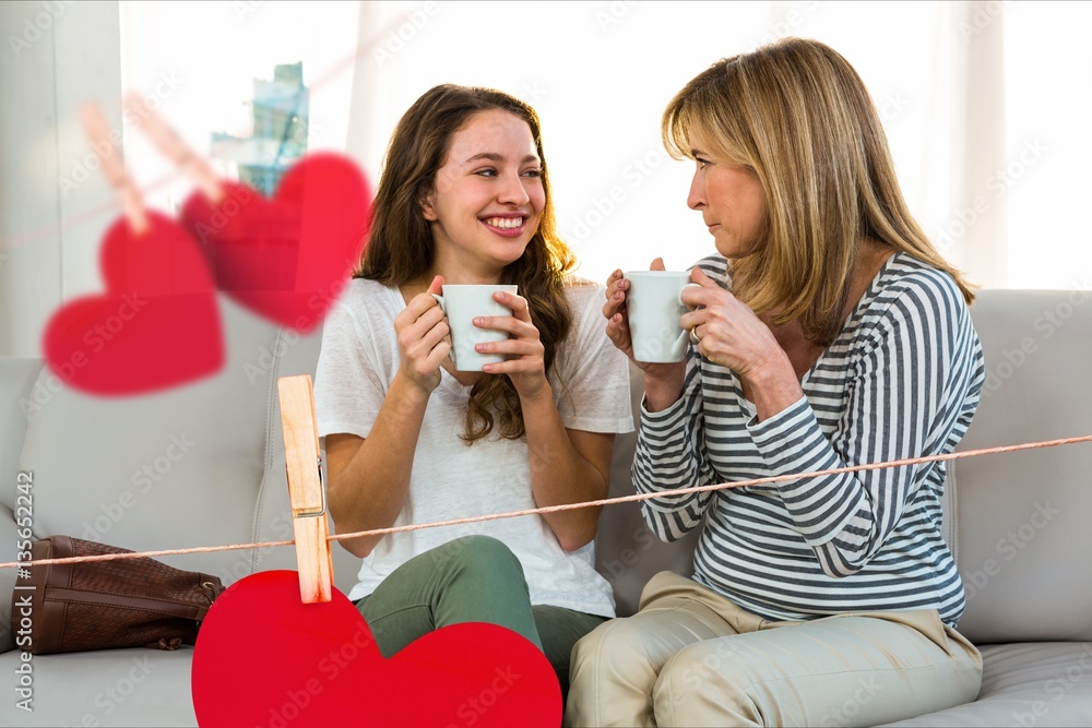 Composite image of happy women holding coffee mug