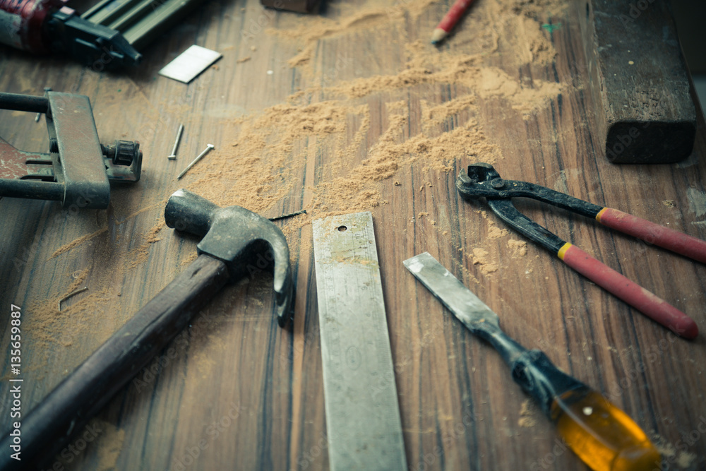 wood workshop with handcraft tools and raw wood on construction