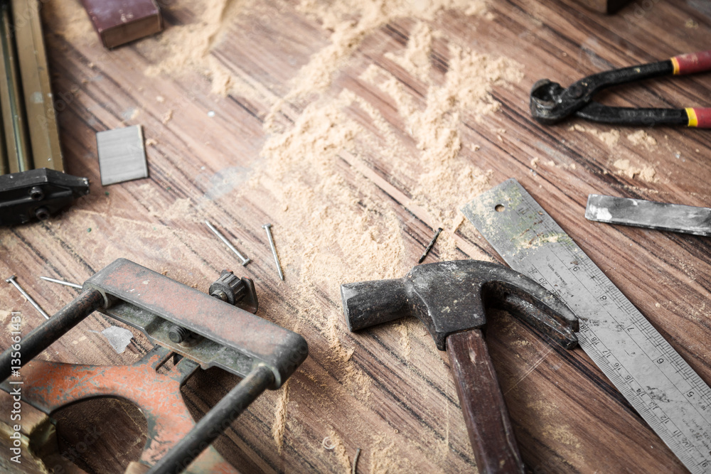 wood workshop with handcraft tools and raw wood on construction