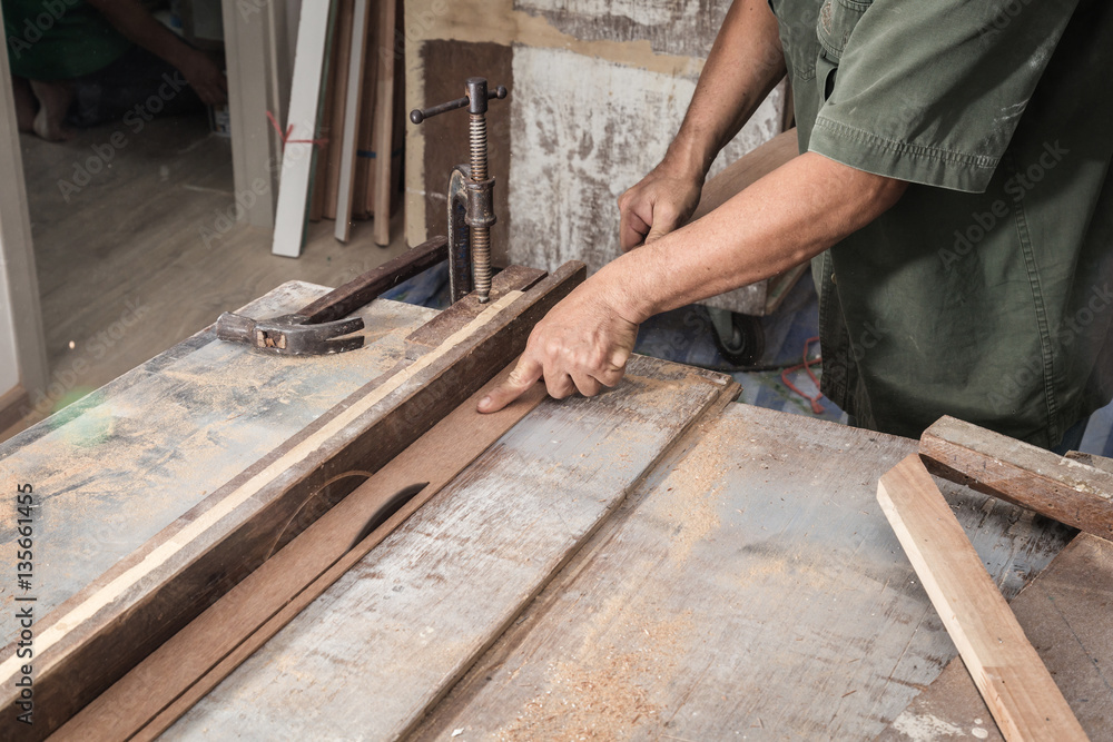 wood workshop with handcraft tools and raw wood on construction