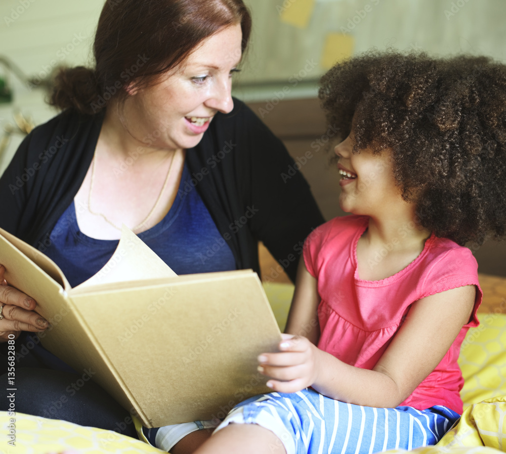 Reading Mother Daughter Reading Story Book Concept