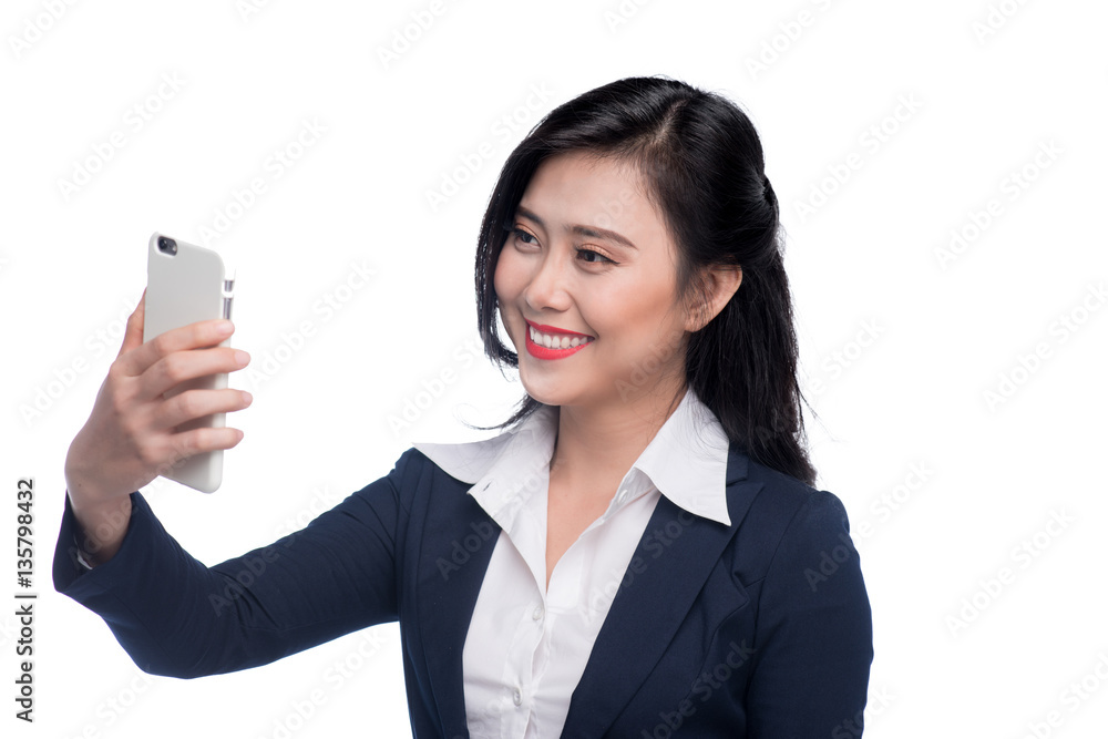 Asian businesswoman taking selfie photo by smartphone.